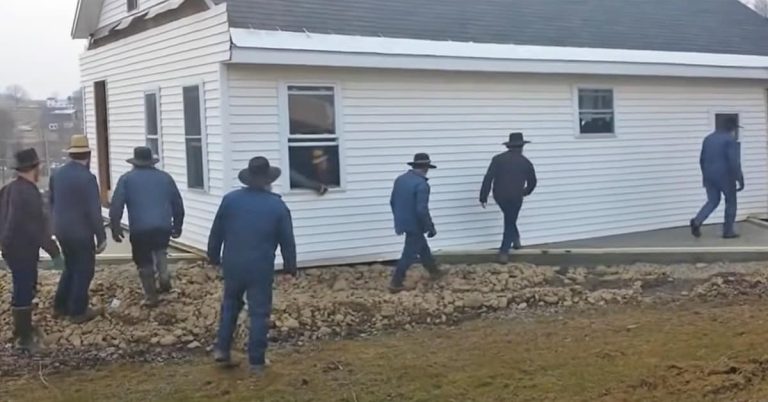 Group Of Amish Men Move Entire Building Using Only Their Brute Strength 